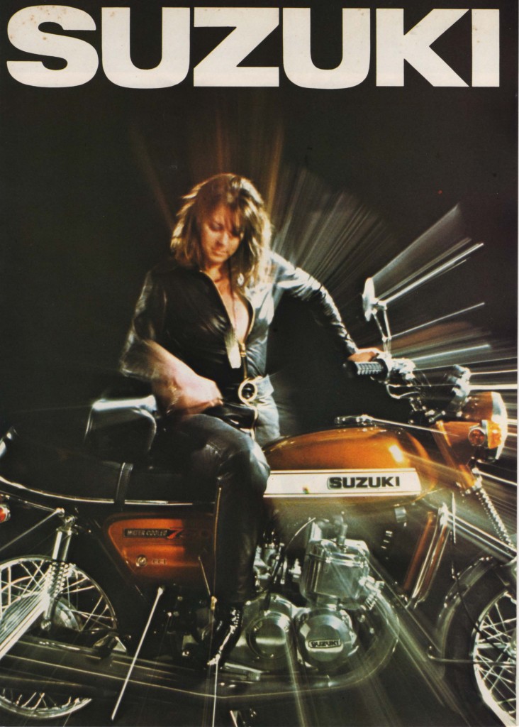 suzuki gt750 with leather clad babe